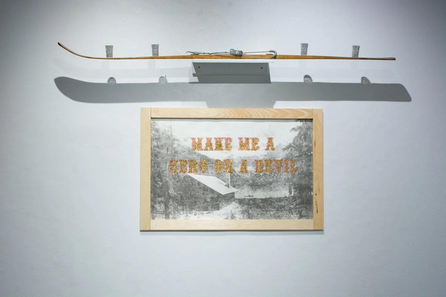 MAKE ME A HERO OR A DEVIL, 2014 Transfer, silkscreen, sparkles, pine wood. 30" x 40" Photo by Adrienna Matzeg