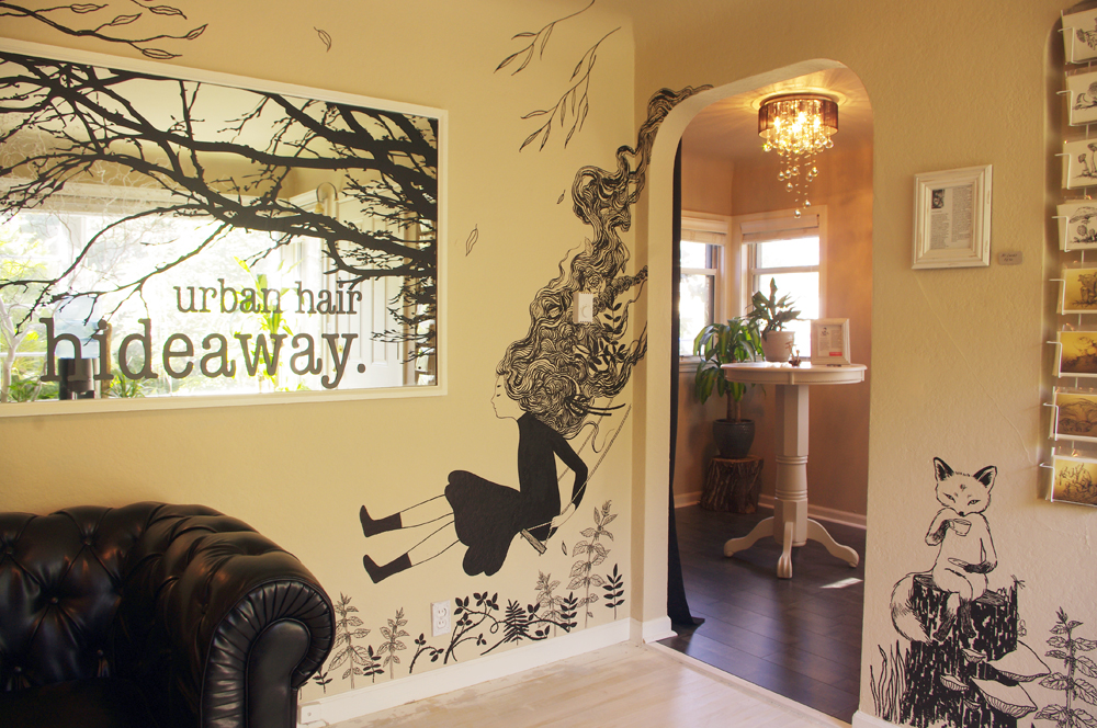 Immediately to your right upon entering, you're greeted with a girl on a swing and a tea-drinking fox! I had the pleasure of helping add some flavor to the interior of the space with some flowing organic black and white murals! I created these with acrylic paint pens. This is my first time working with this method, and it was so much fun! And, if I do say so myself, the results are pretty damn fine.
