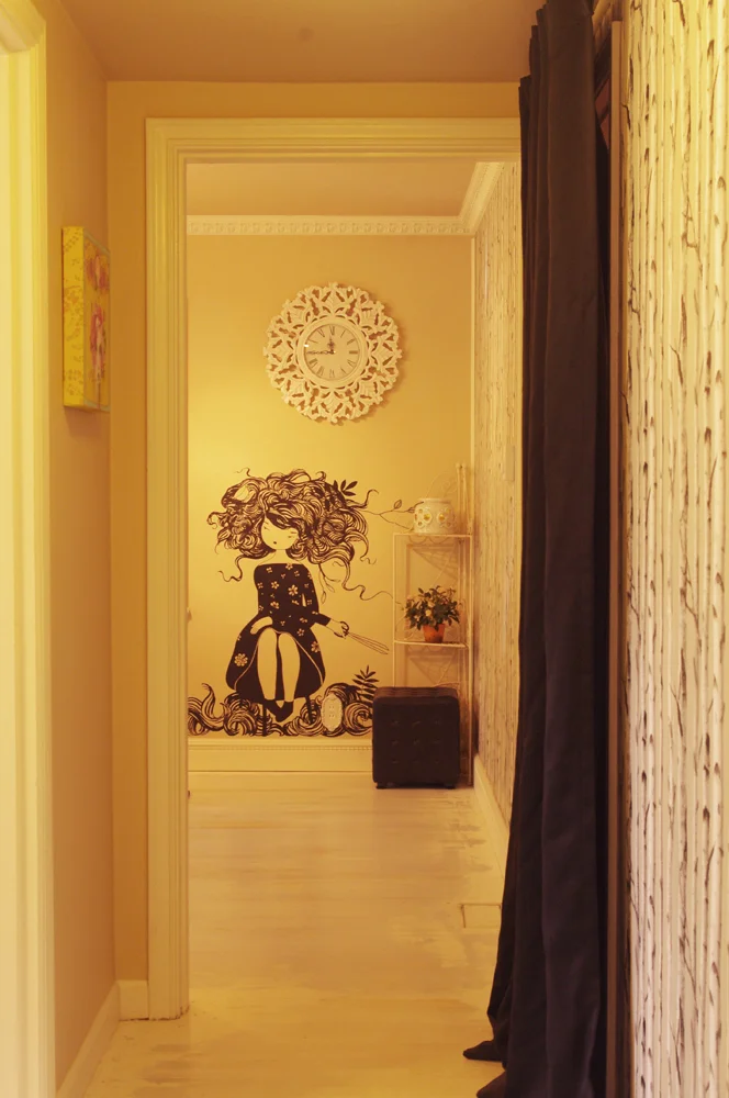 Here's the view in the hall from the hair-washing room to the cutting room. Poorly photographed, but check out this great birch-tree wallpaper.