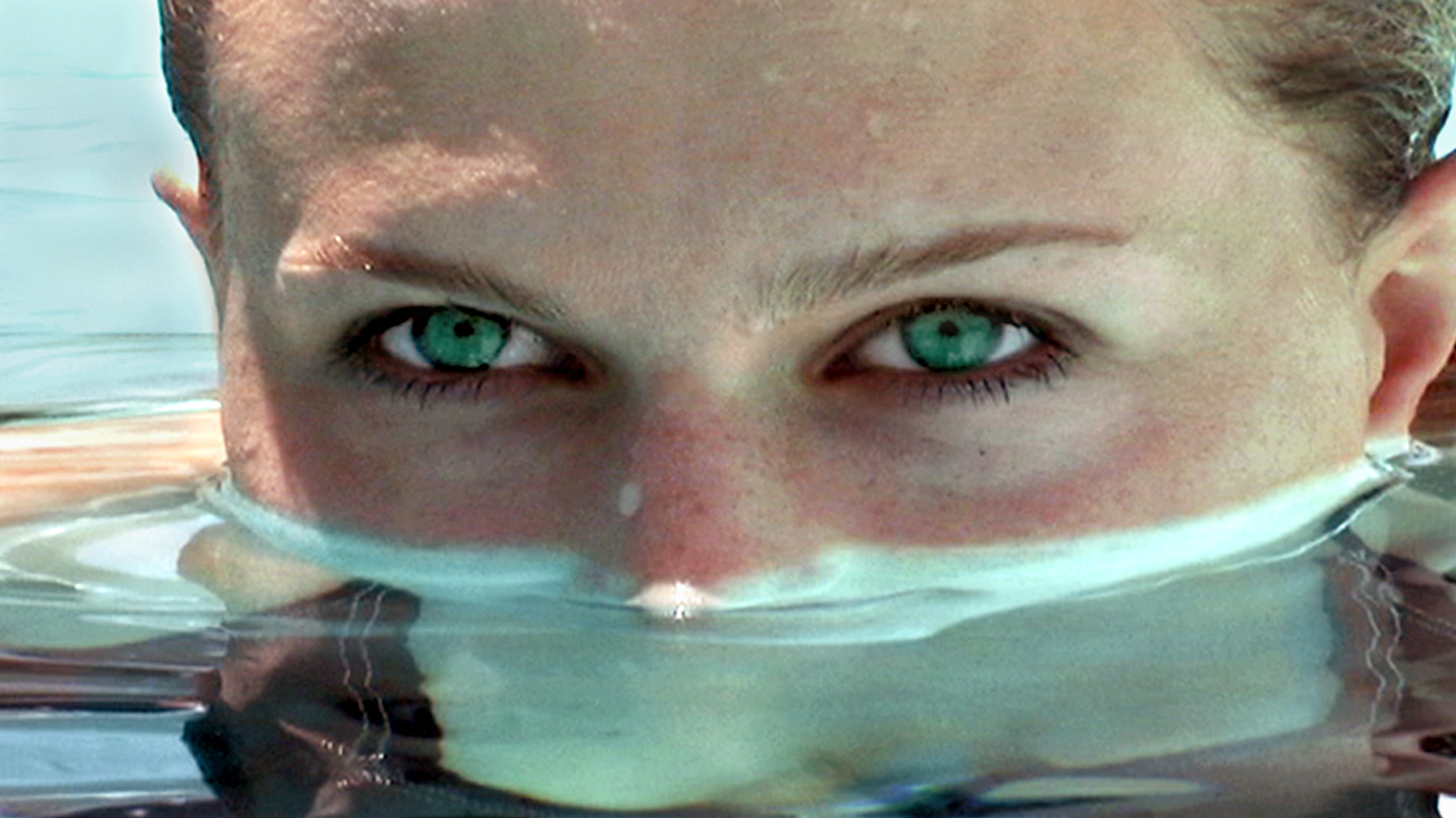 Mandy Hughes eyes uncertainty as she battles chronic Lyme disease in UNDER OUR SKIN, a film by Andy Abrahams Wilson.