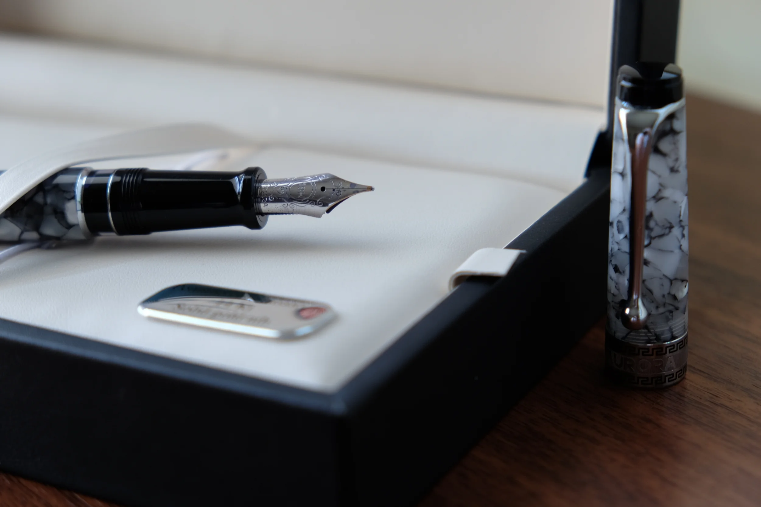 The Aurora Optima features a 18k nib. This one started life as a medium but has been ground to a cursive italic.