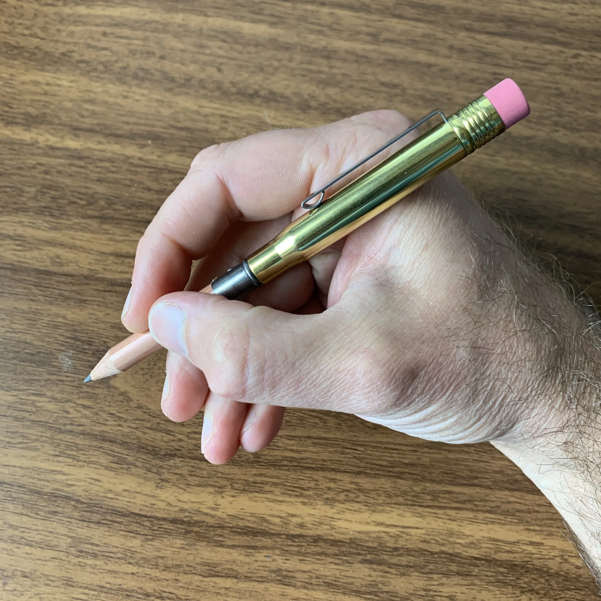 Traveler's Company Brass Bullet Pencil in Hand
