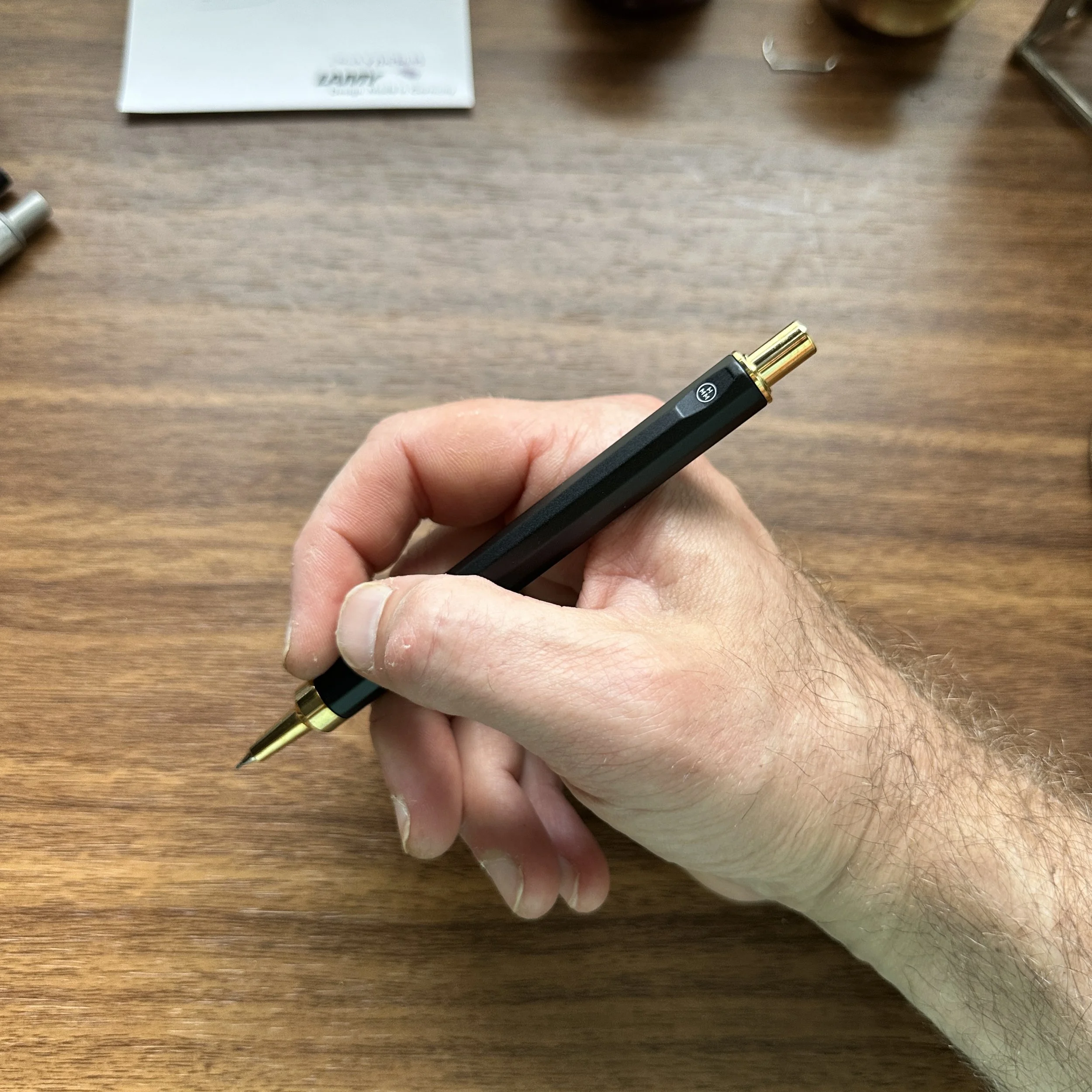 HMM Mechanical Pencil Matte Black and Gold In-Hand