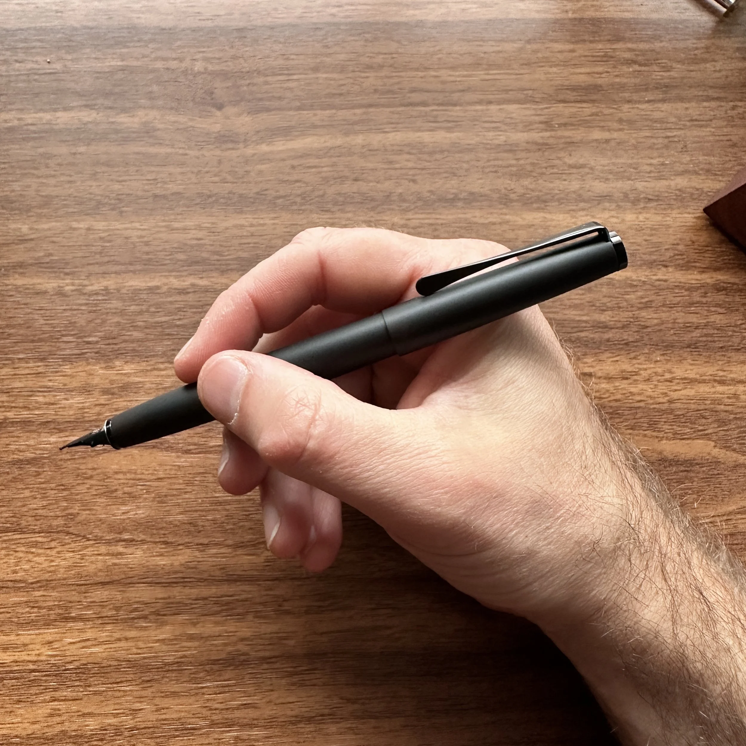 Lamy Studio LX All-Black Ballpoint In-Hand