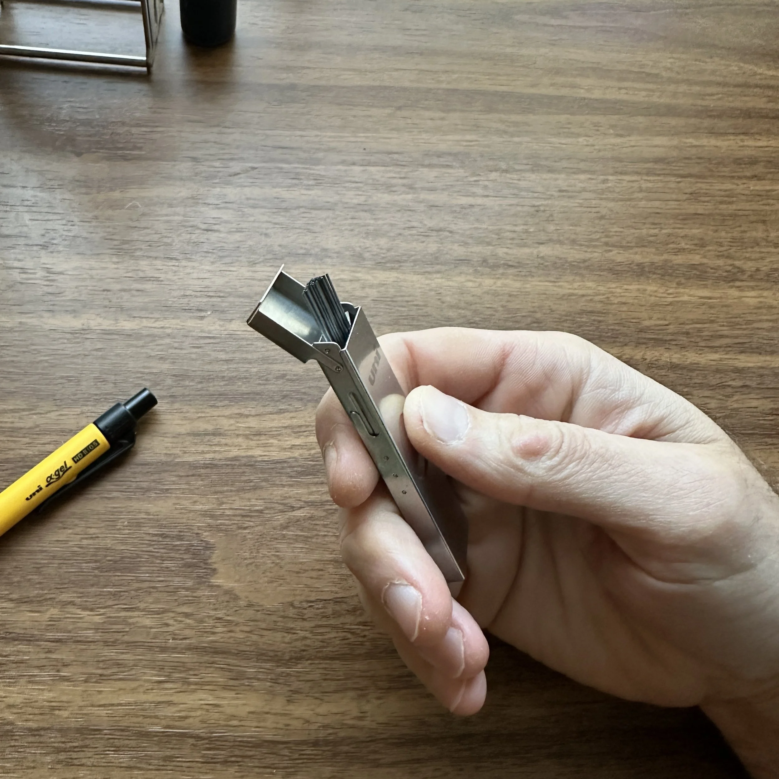 Uni Metal Mechanical Pencil Lead Case (Open In Hand)
