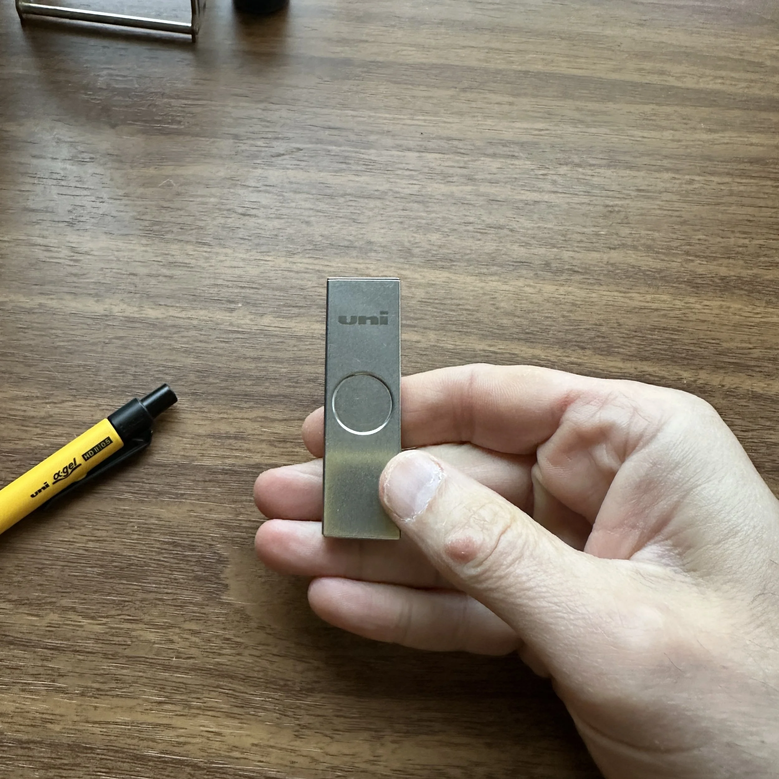 Uni Metal Mechanical Pencil Lead Case (in hand)