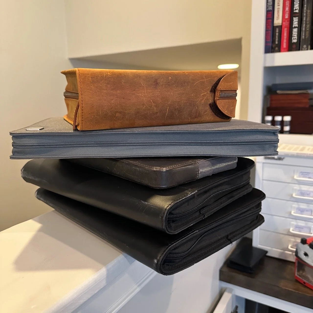 Pen Storage Albums Stacked on Top Of One Another