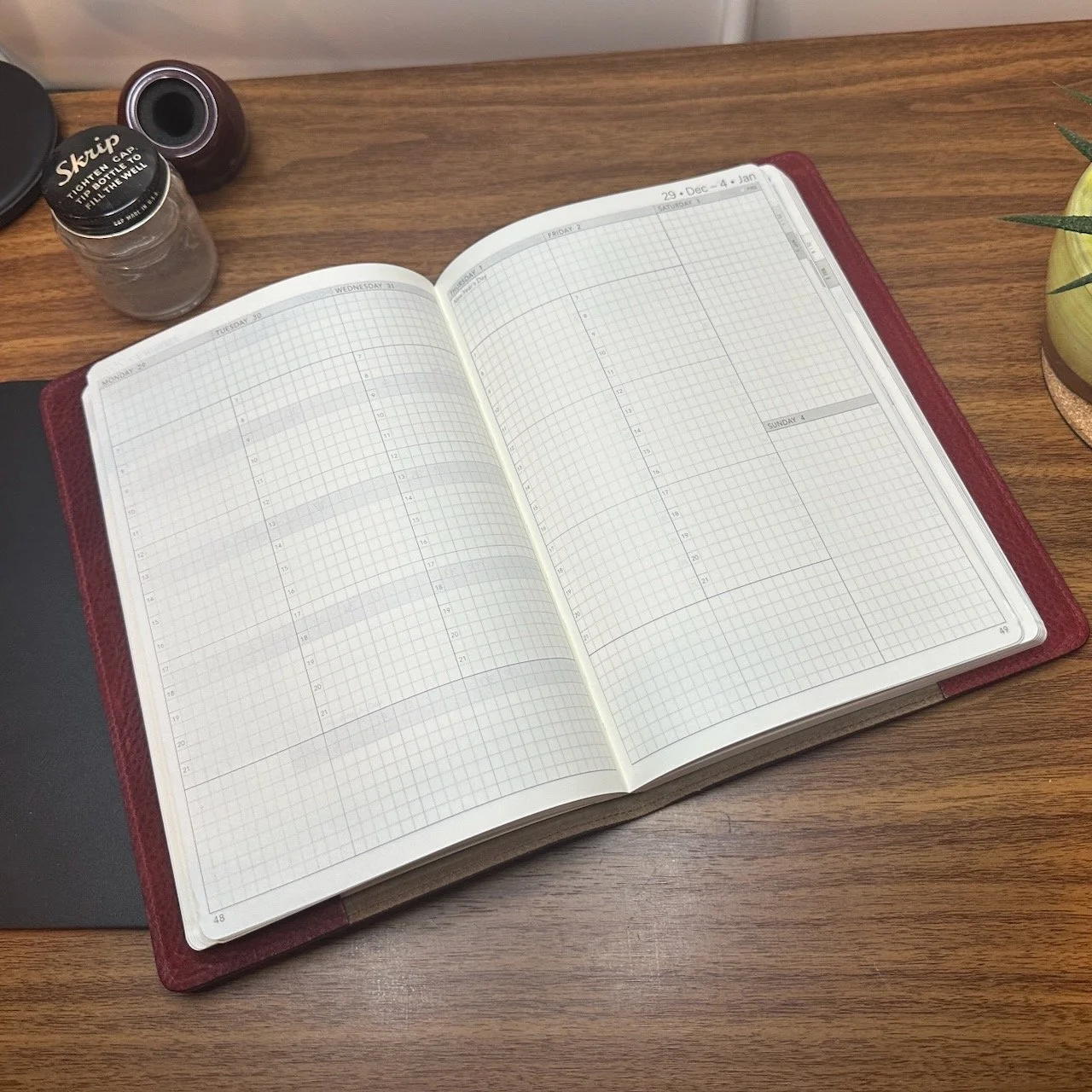 Wonderland222 A5 Core Stacked Weekends Planner, Open on Desk to Weekly Layout