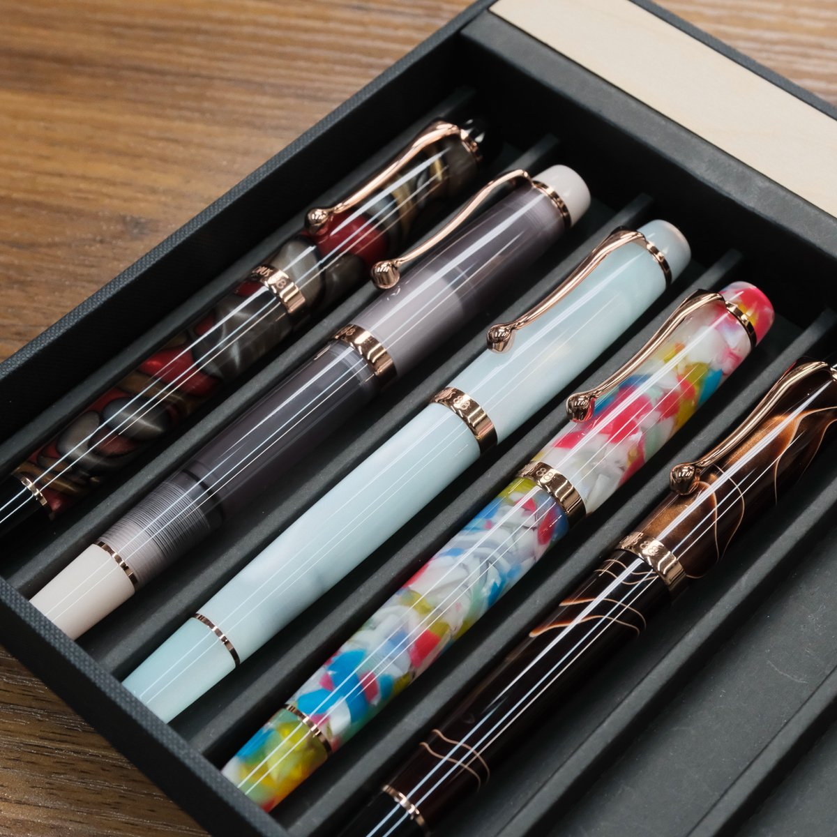 Opus 88 Harmony Fountain Pens arrayed in a tray