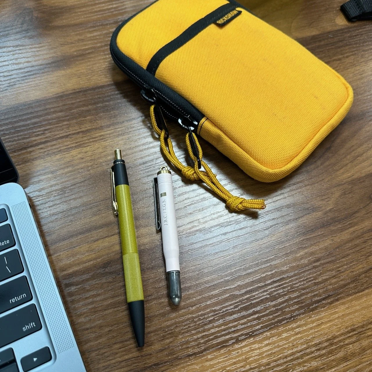 Two travel ballpoints, including a Laurett's Waka Ebonite Ballpoint and a Travel Pocket Pen
