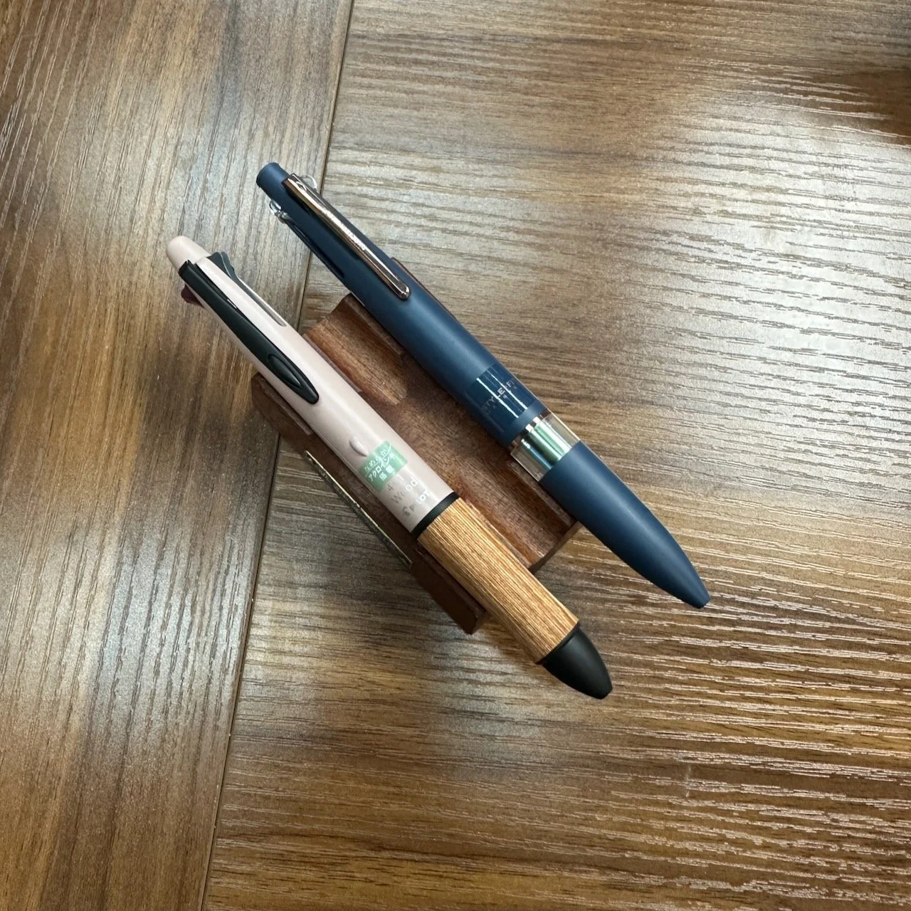 Uni Style Fit and Pilot 4+1 Multi Pens on Pen Stand
