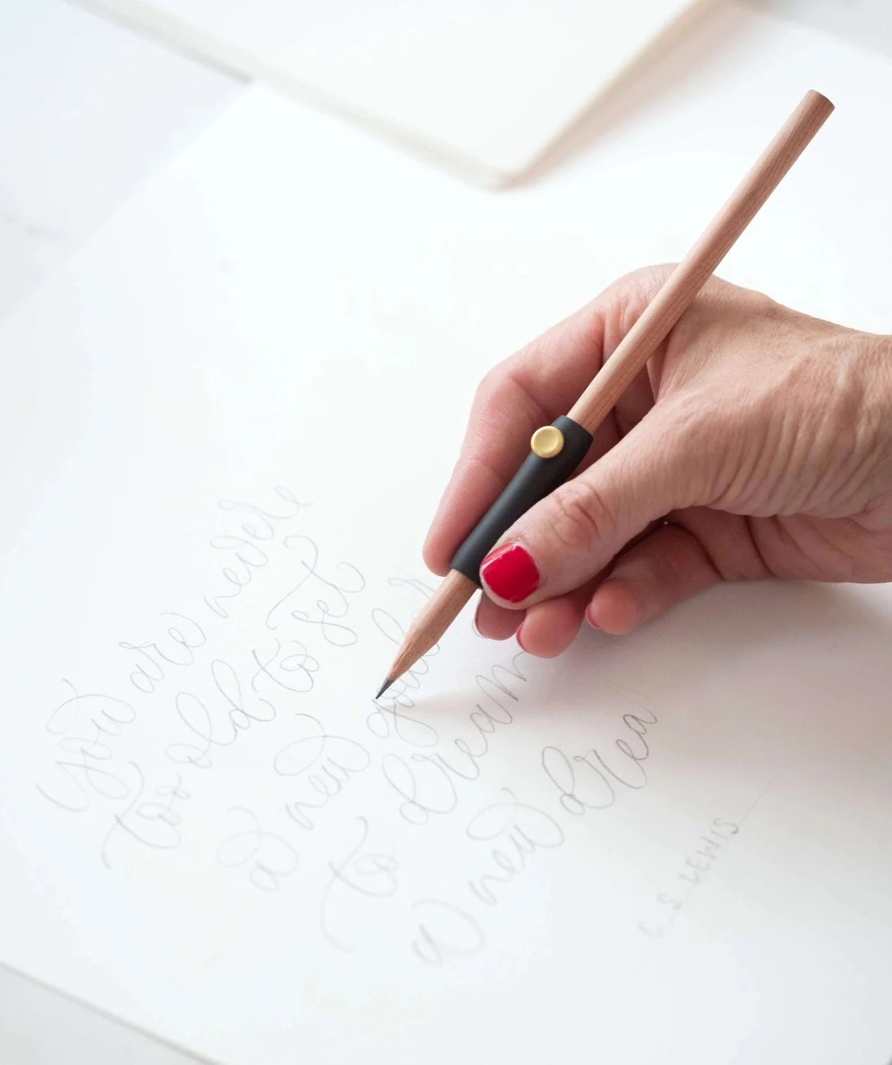 Poise Pencil Extender in Hand