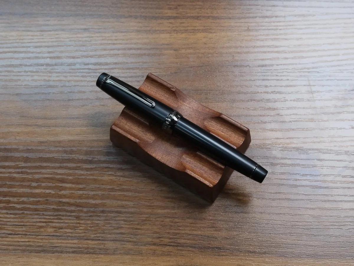 Sailor Imperial Black Fountain Pen Capped on Pen Stand