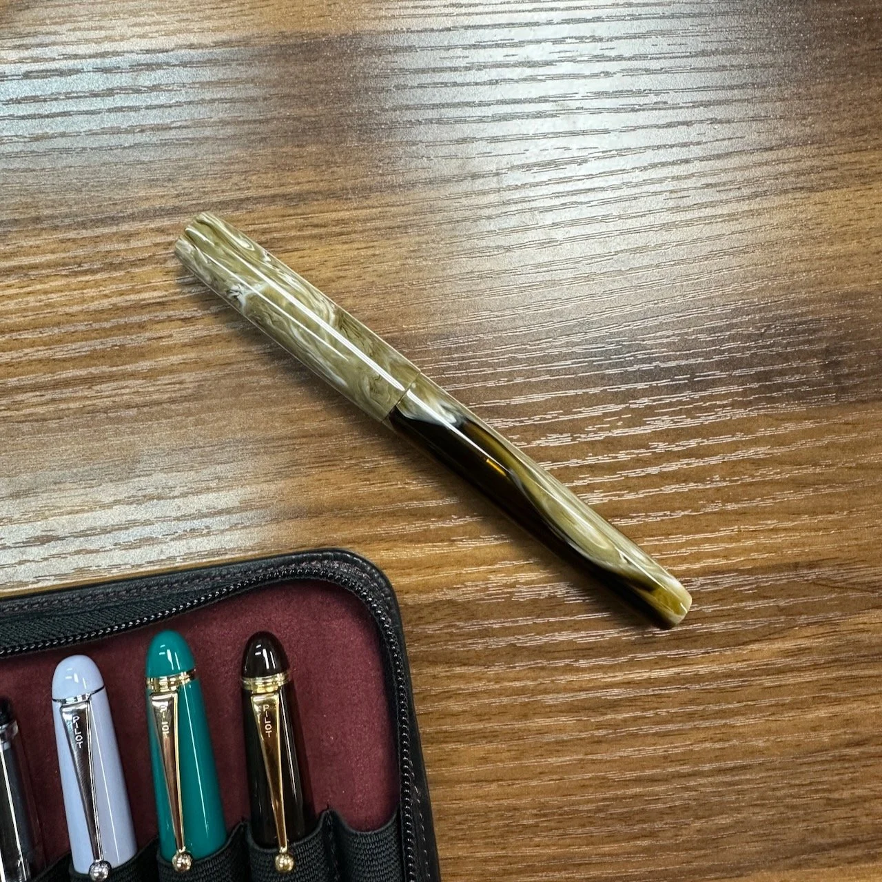 Bonecrusher7 Studios Mocha Latté Fountain Pen on Table