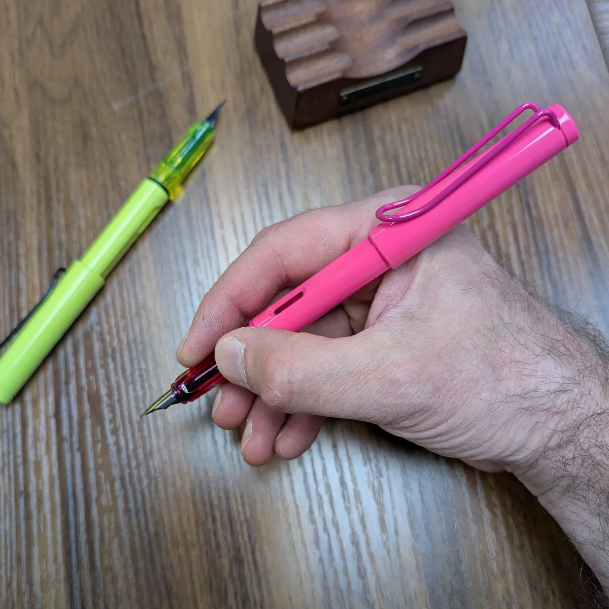Lamy Safari 2026 Neon Pink and Neon Yellow Fountain Pen In hand