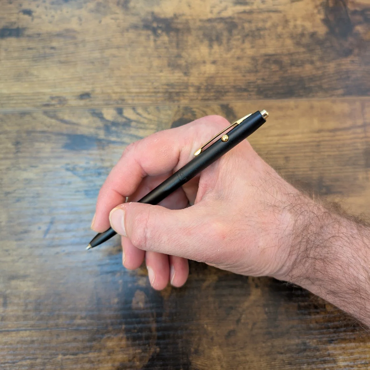 Fisher Space Pen Shuttle Pen Matte Black and Gold in-Hand