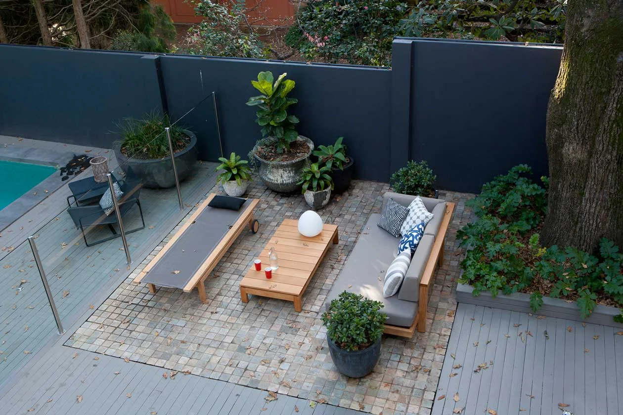 Take it further and use hardscaping to define the area