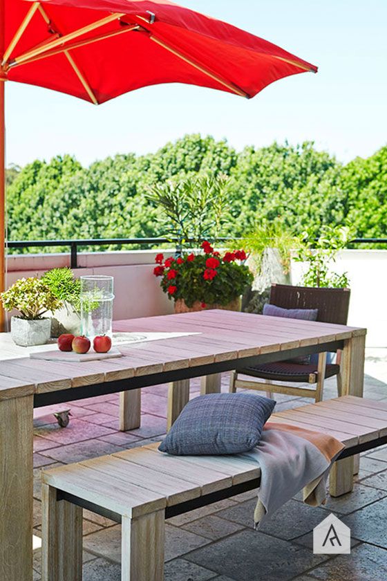 Glass to accessorise and a vibrant outdoor umbrella will breath new life in to your outdoor space