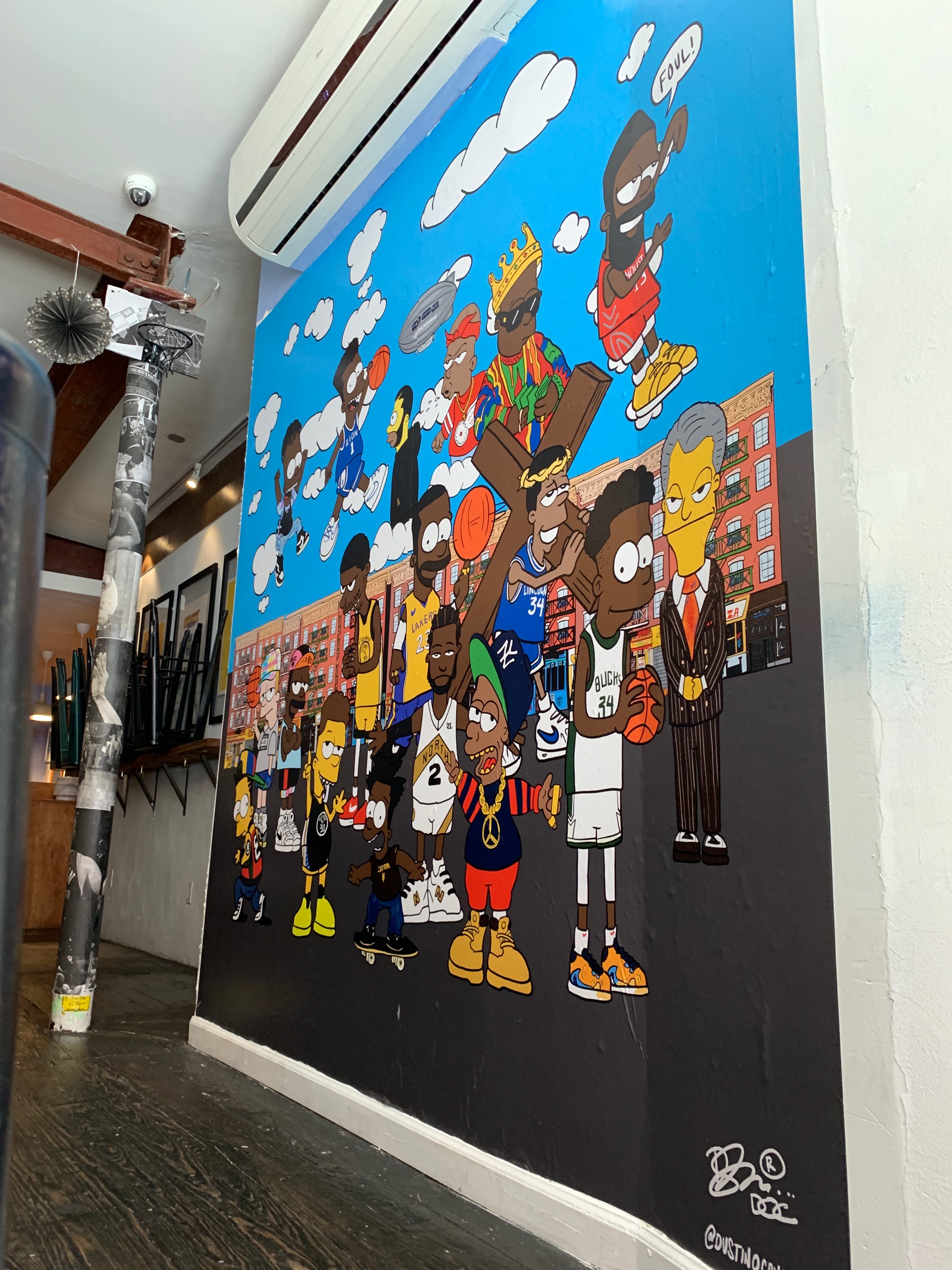 A new mural installed at Boys Don't Cry in NY, in honor of The NBA Finals. As in all of my work, a level of detail and authenticity is what inspired the latest work. Located on The Lower East Side’s iconic Orchard St. I wanted to make sure that I was able to convey the neighborhood, the people, shops and culture that presided before today. See how many people you can identify. Also be sure to check out the other NBA Finals inspired works are also on display throughout The summer.
