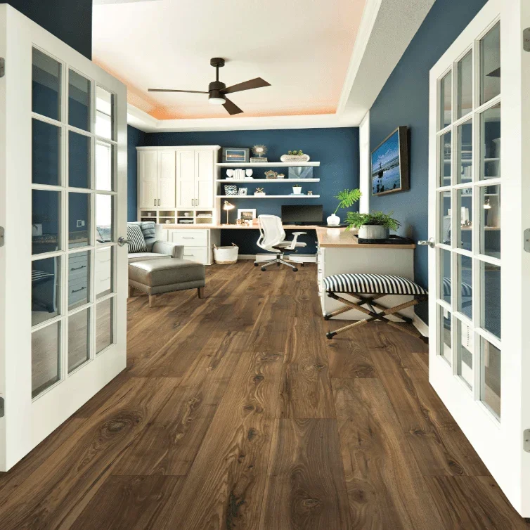 wood flooring in a deep blue room with white trim and sleek furniture