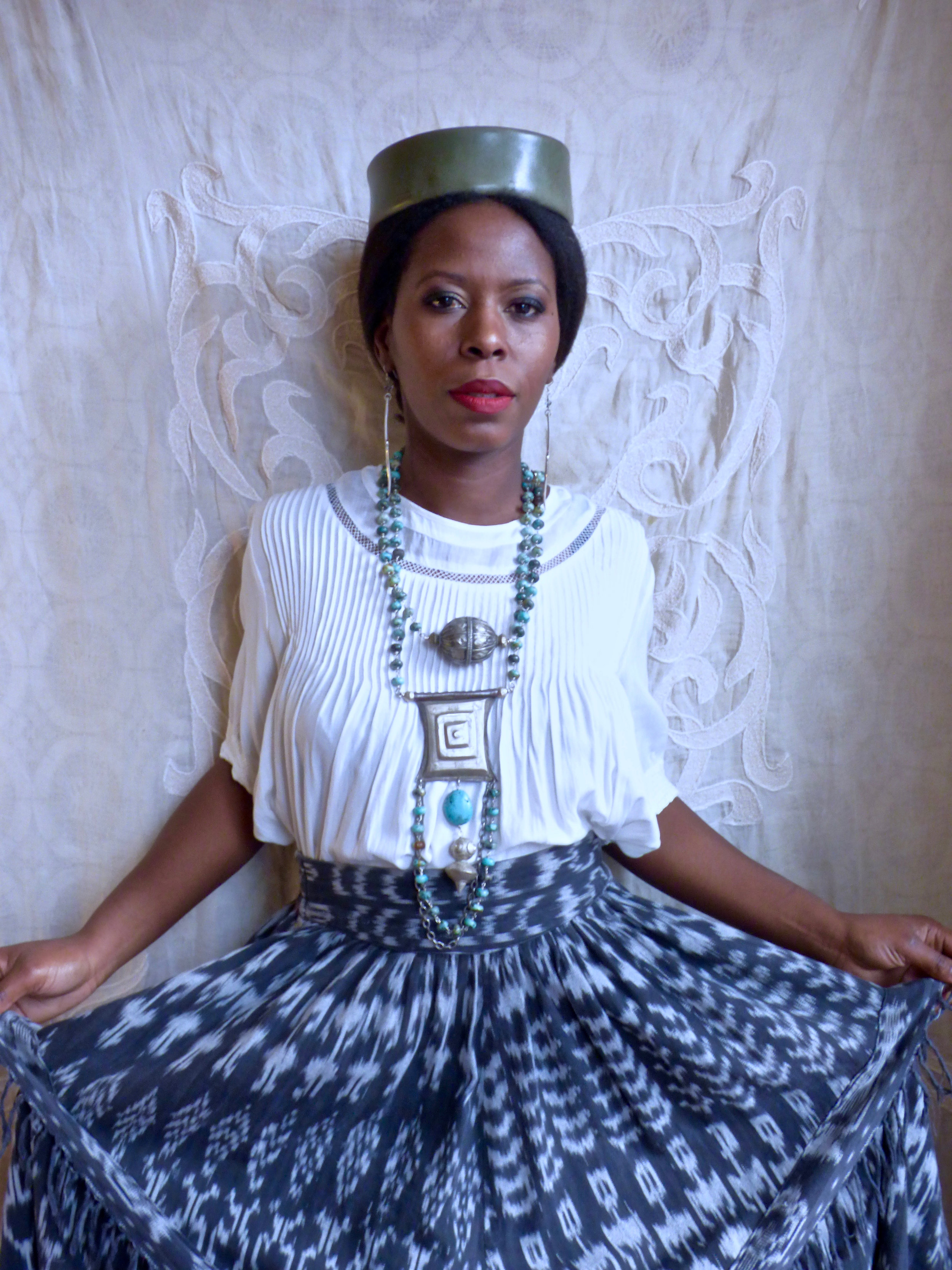  African turquoise beads with Tuareg medallion and Yemenite bead. 