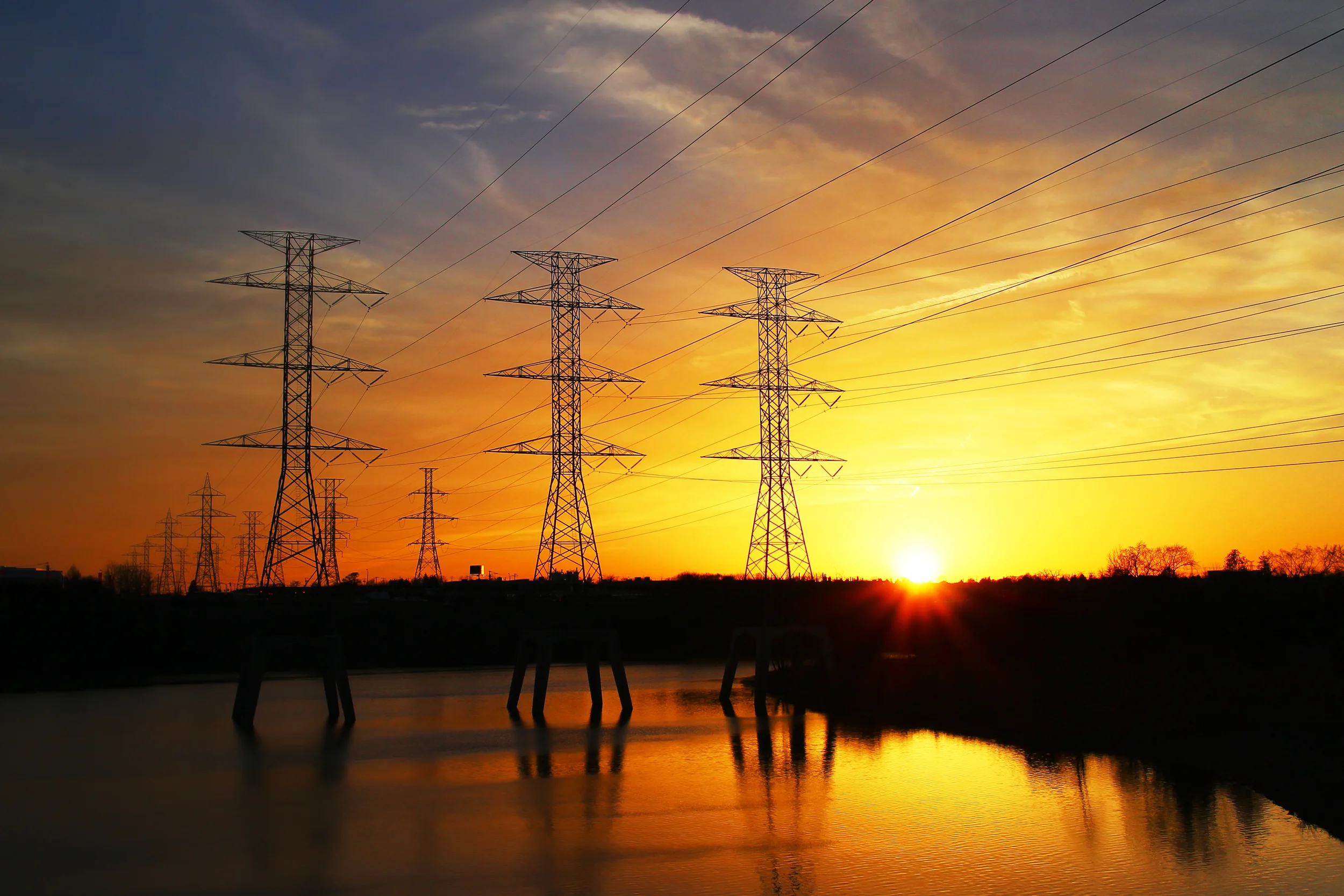 bigstock-High-voltage-power-line-towers-45199381.jpg