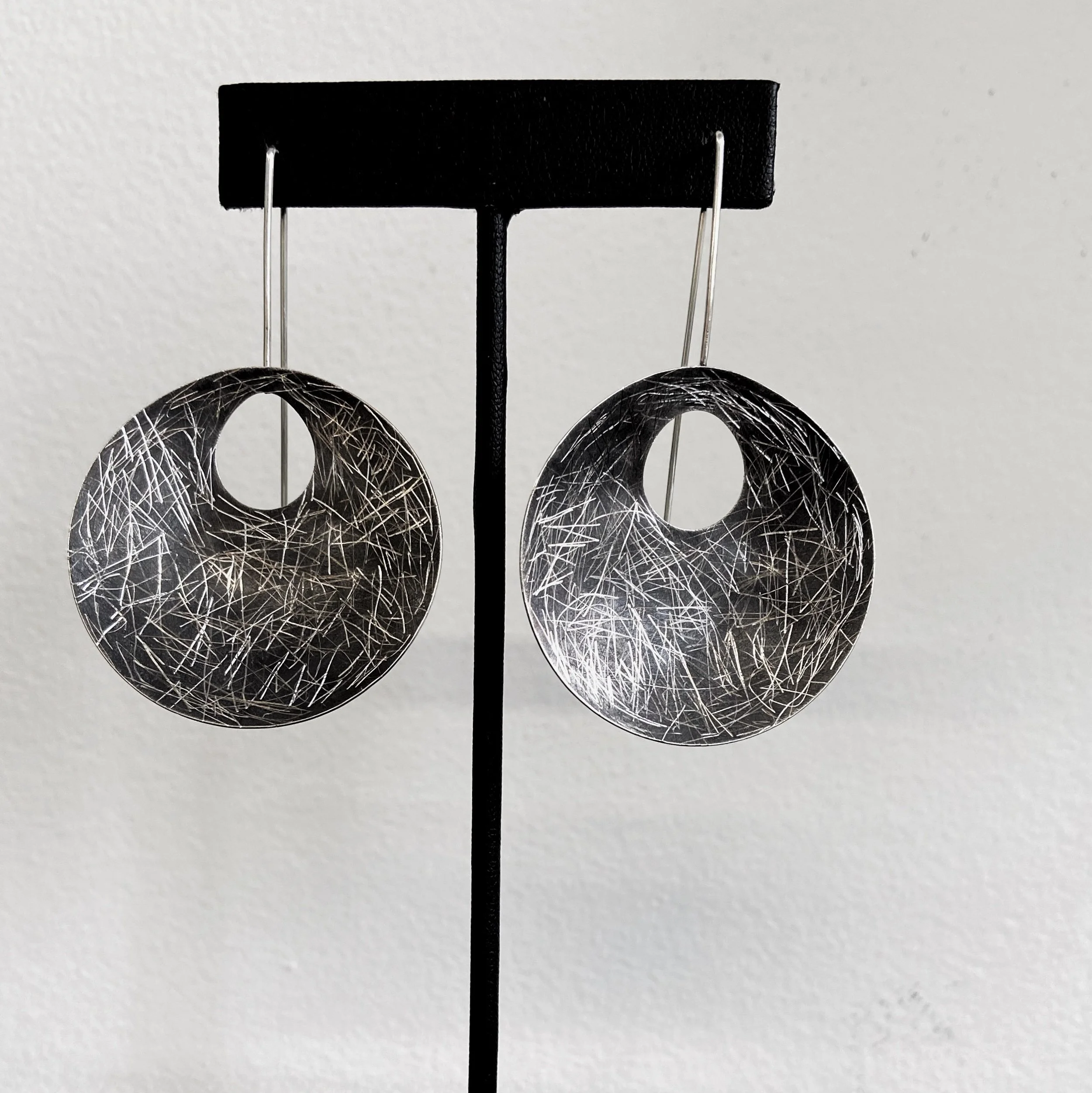 Earrings- Circle with circle cutout, oxidized, cuts-2.jpg