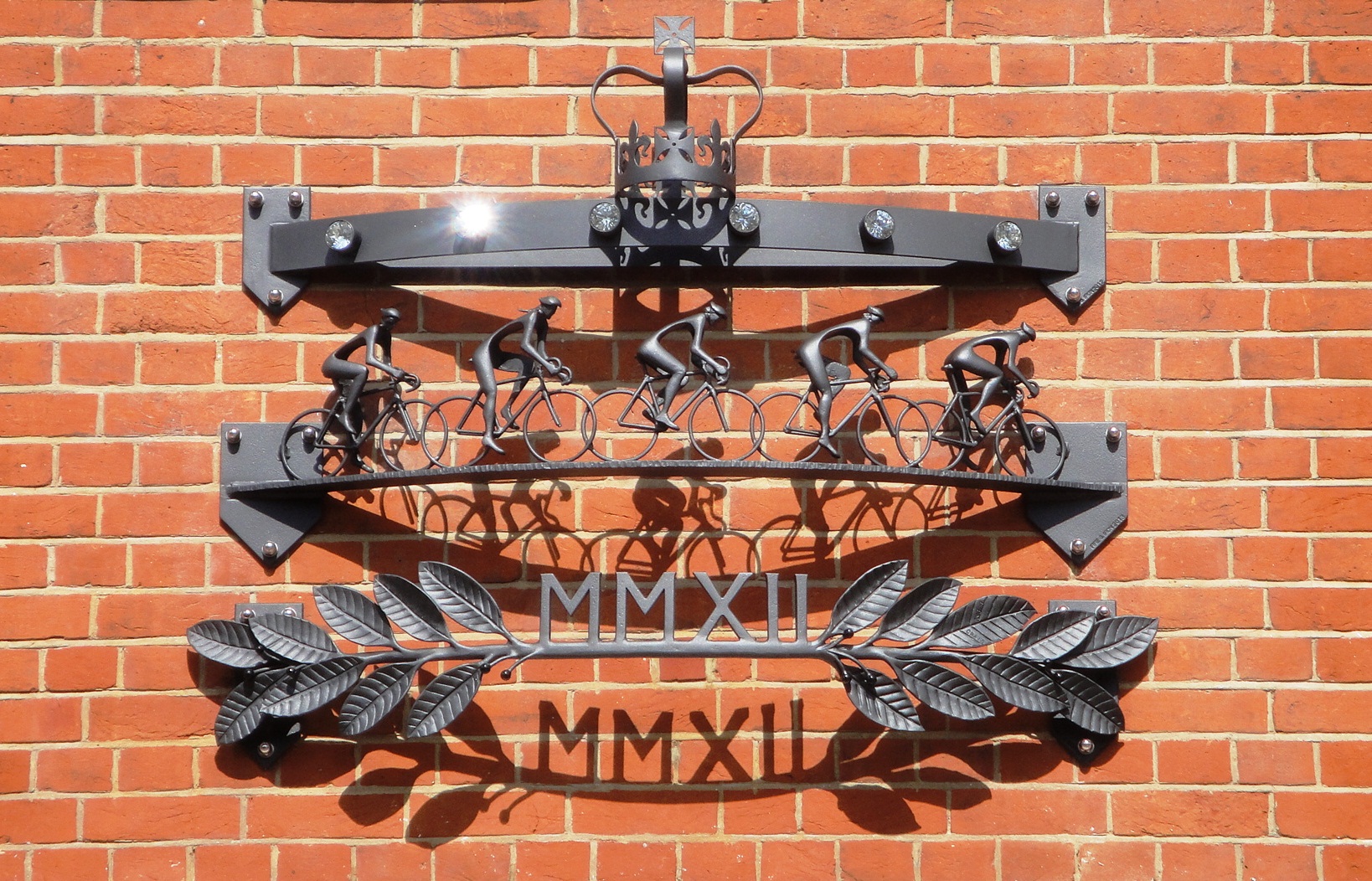 Wall sculpture for façade of the Leatherhead Institute