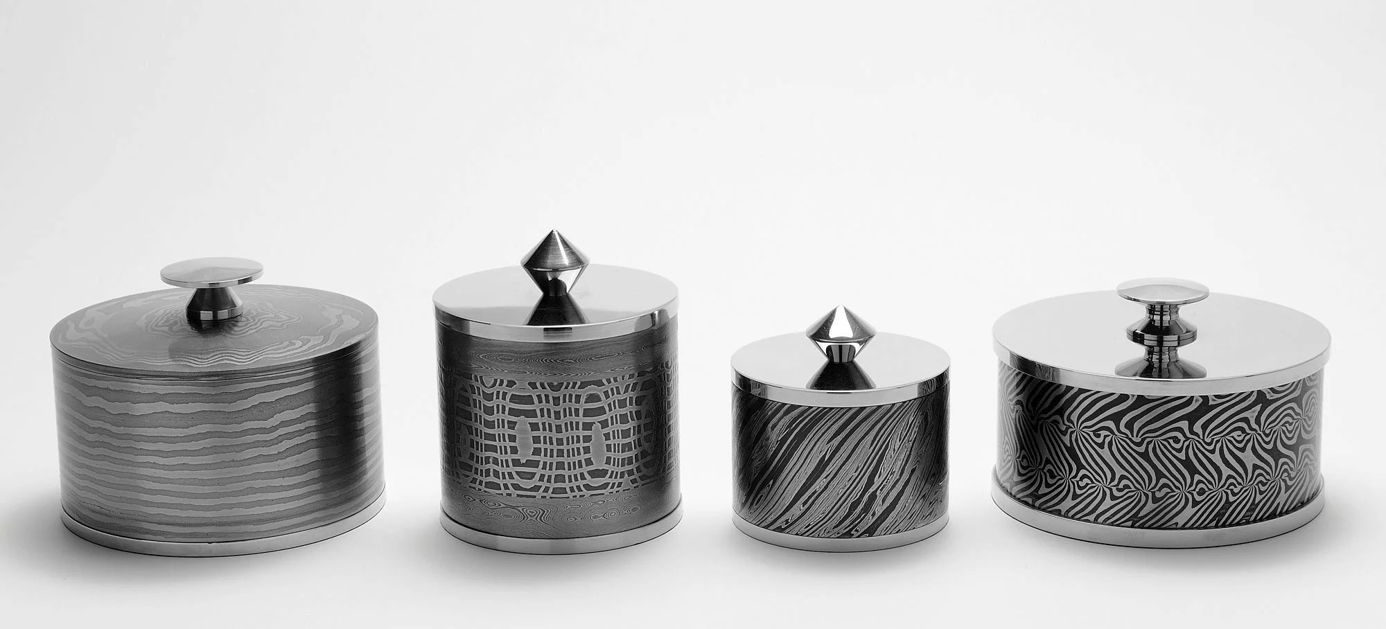 Lidded trinket boxes by Mick Maxen 