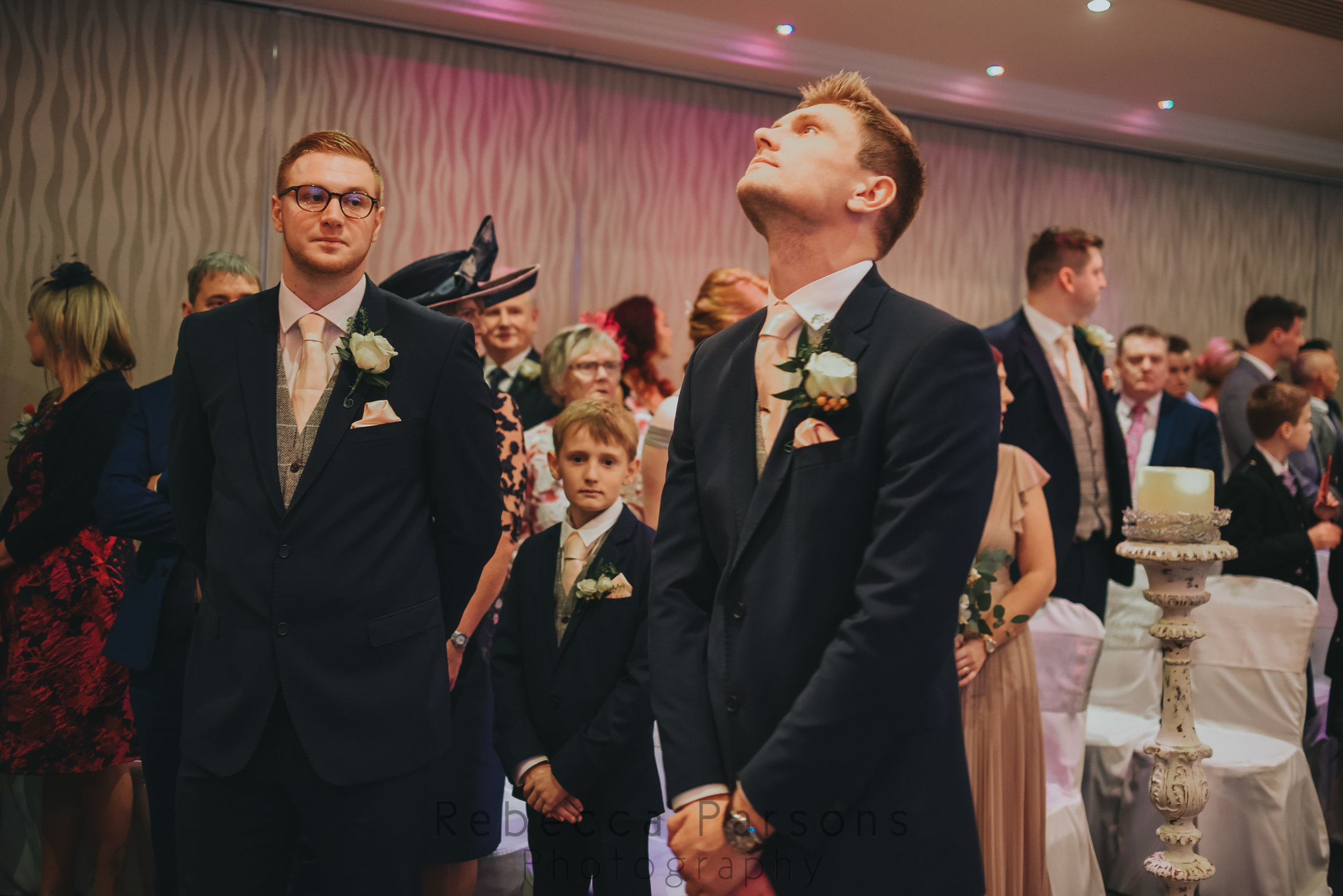 Groom waiting for the bride to walk down the aisle