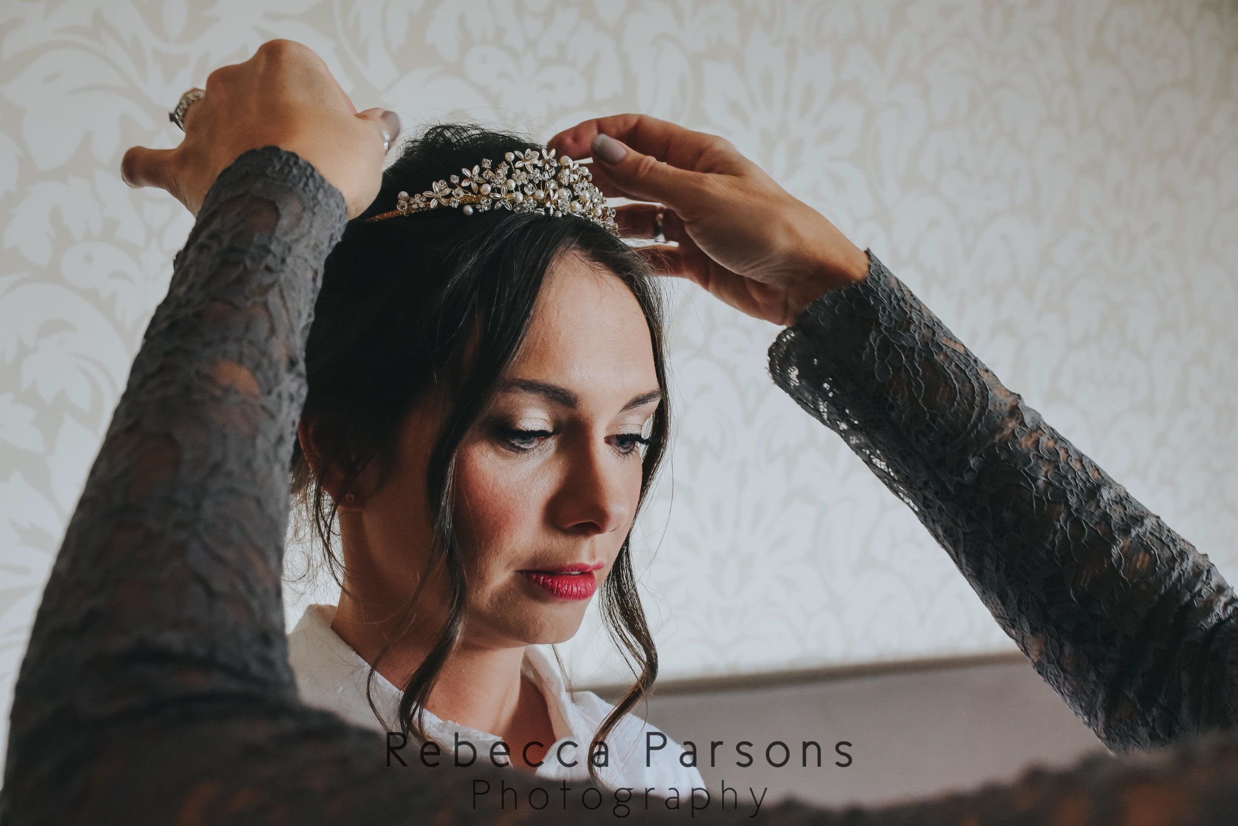 bride tiara being put in place