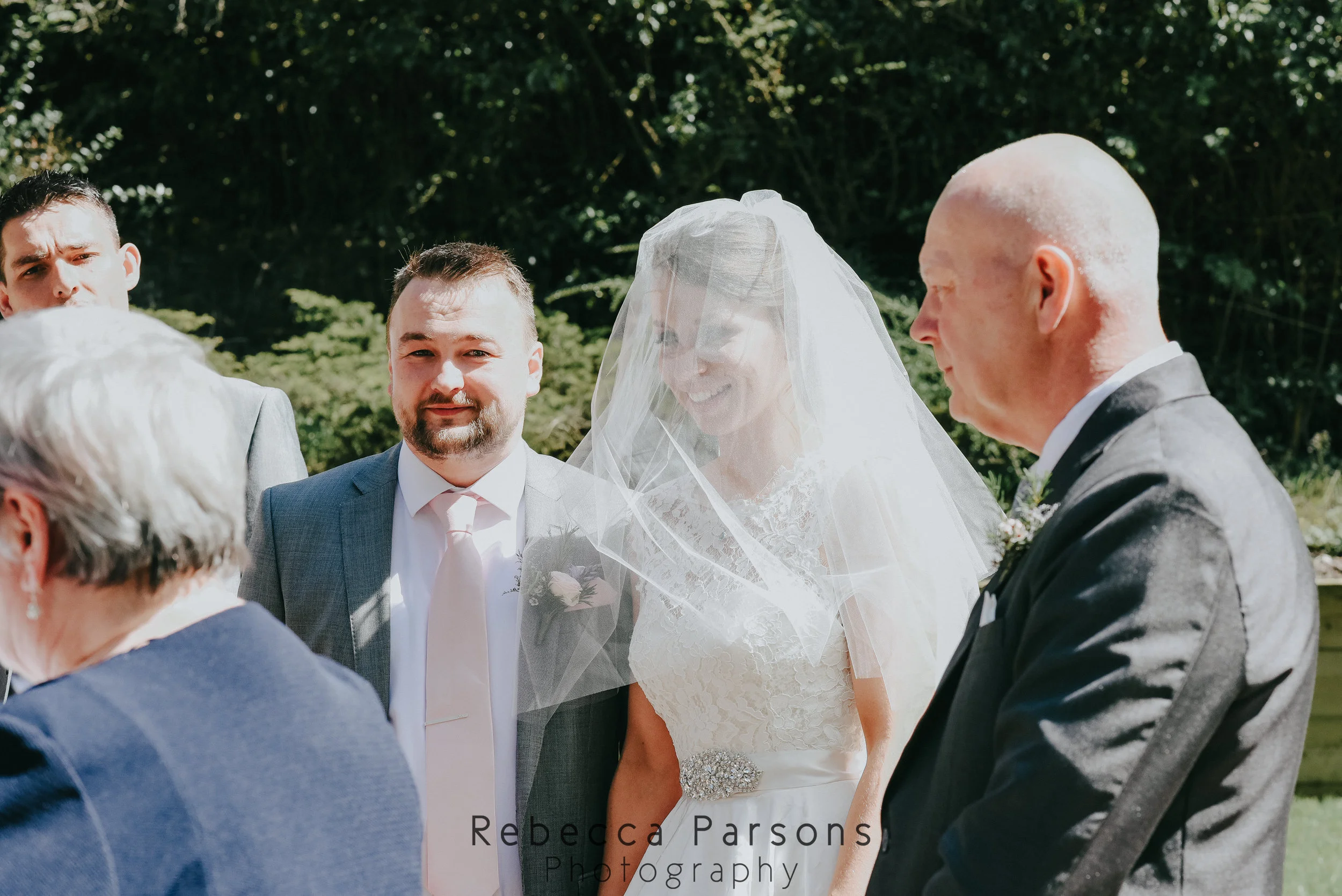 bride and groom at front of service