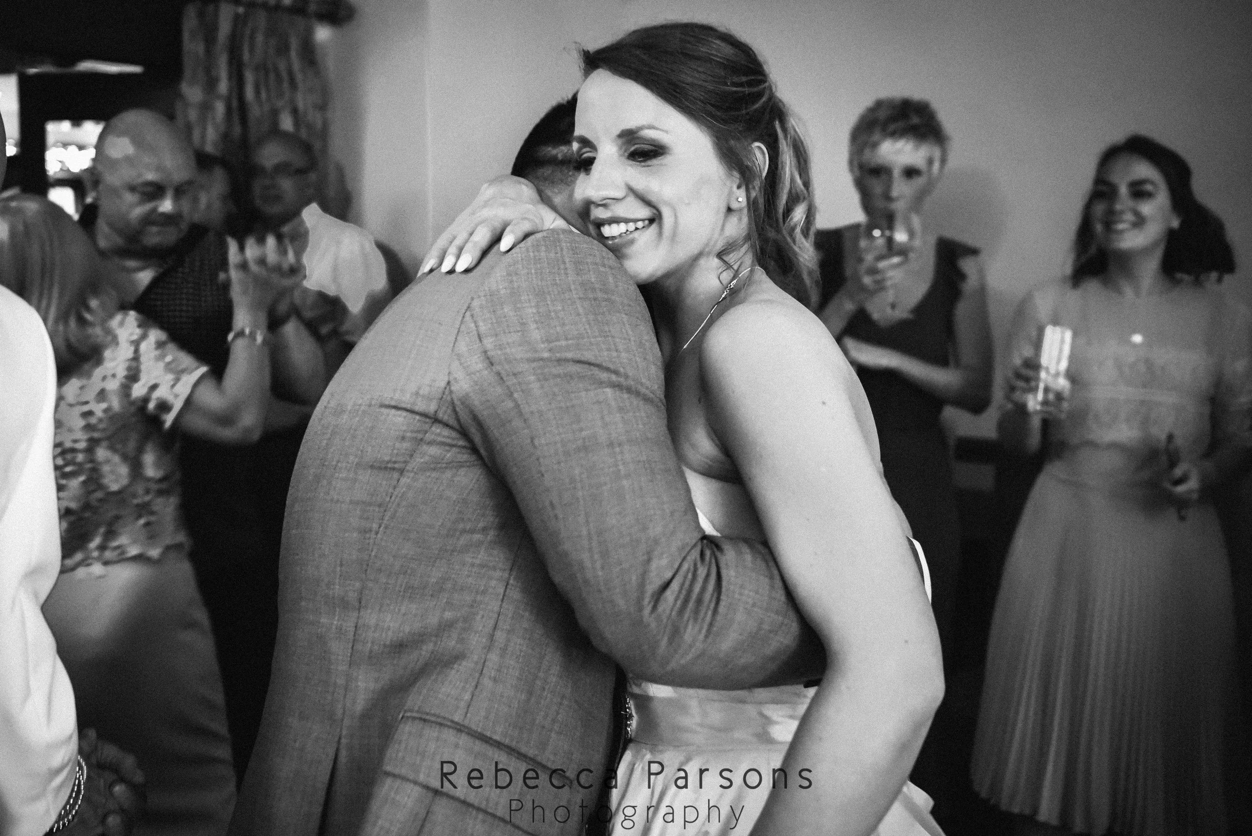 bride and groom dancing