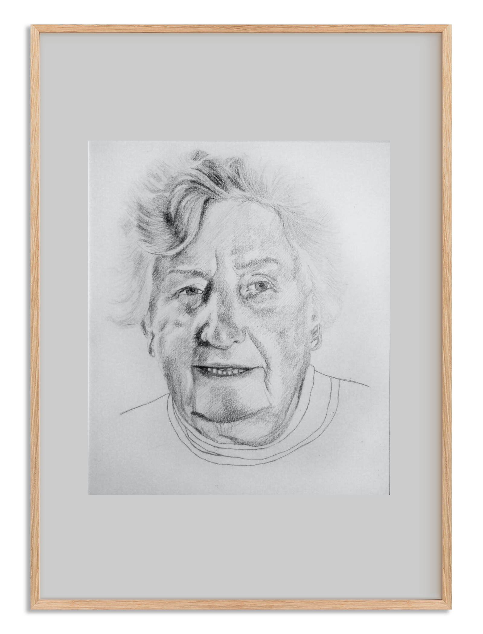 Een portrettekening van een oude dame in een lijst met passe-partout