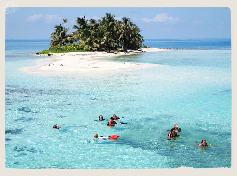Snorkeling in Placencia's pristine tropical waters. 