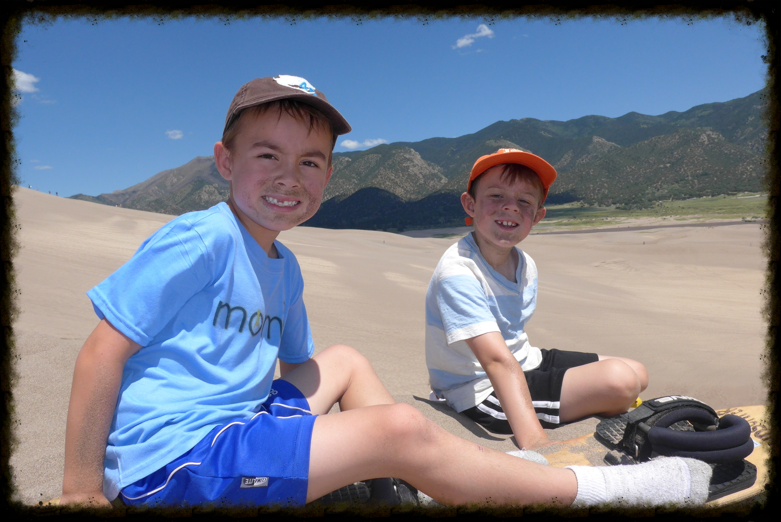 You're sure to get an adrenaline rush while boarding down the dunes. You're also sure to get very dirty. Photo by Michael Mundt