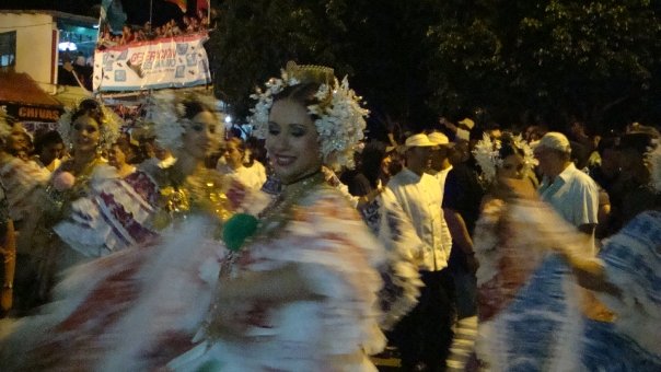  Women dancing and wearing polleras - the national costume of Panama.