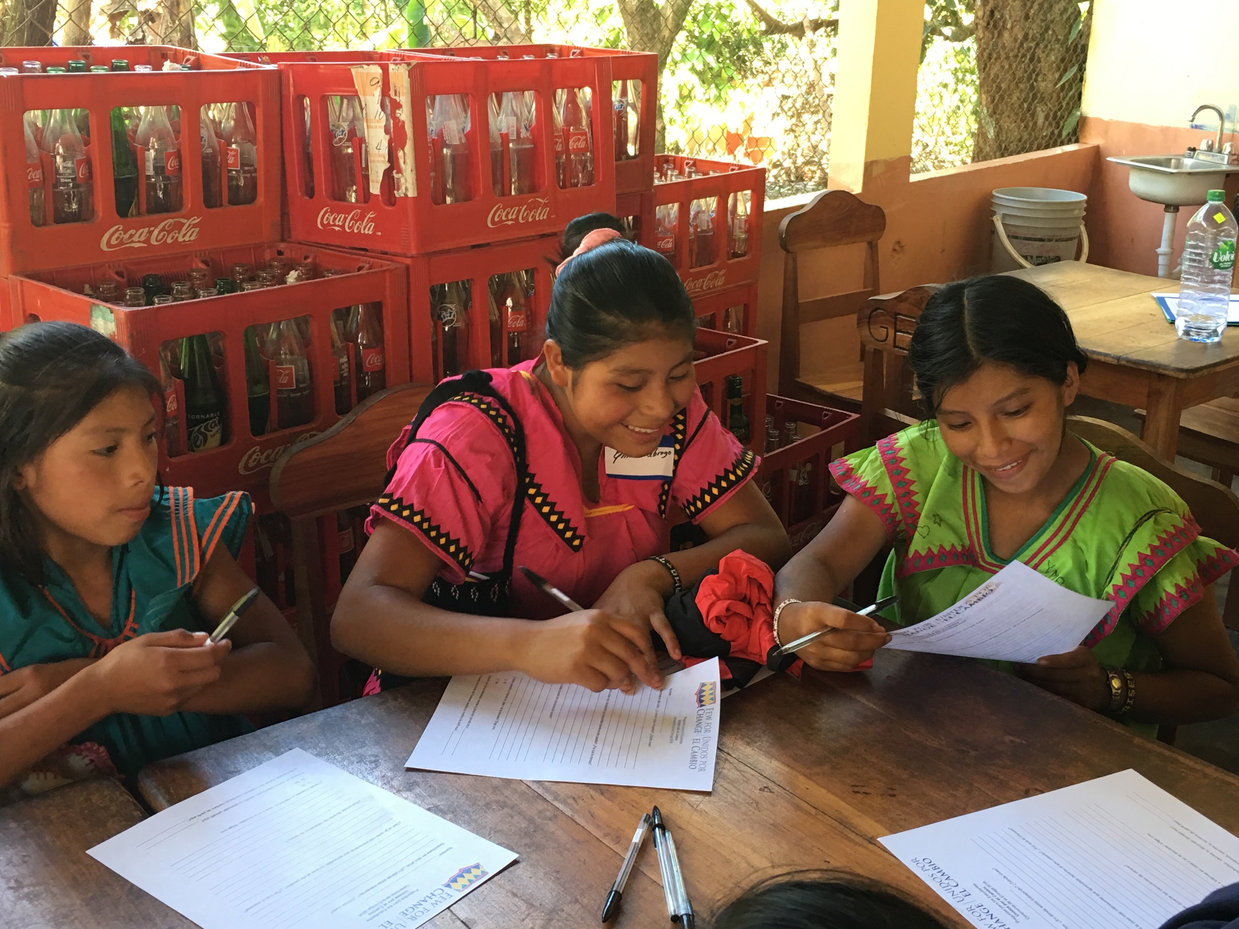 3. FFC scholarship winners Sindy, Emilia, and Xiomara C. share a laugh over their responses to our questions.