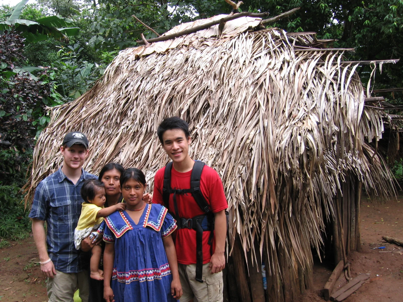 Brooks (left) and Tim (right), Few for Change Co-Founders, with three of our hosts.