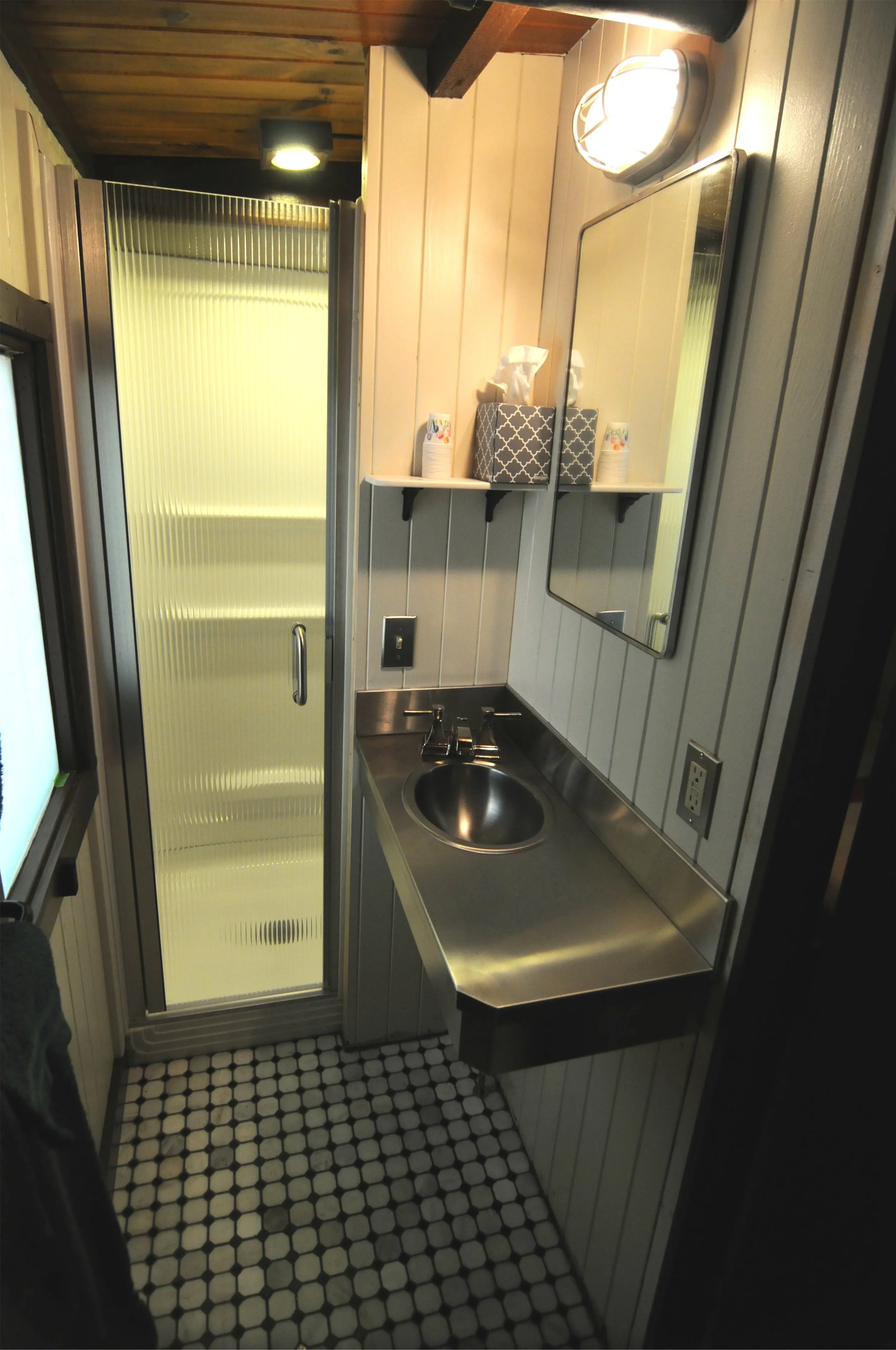 Ultra-modern bath with full shower.