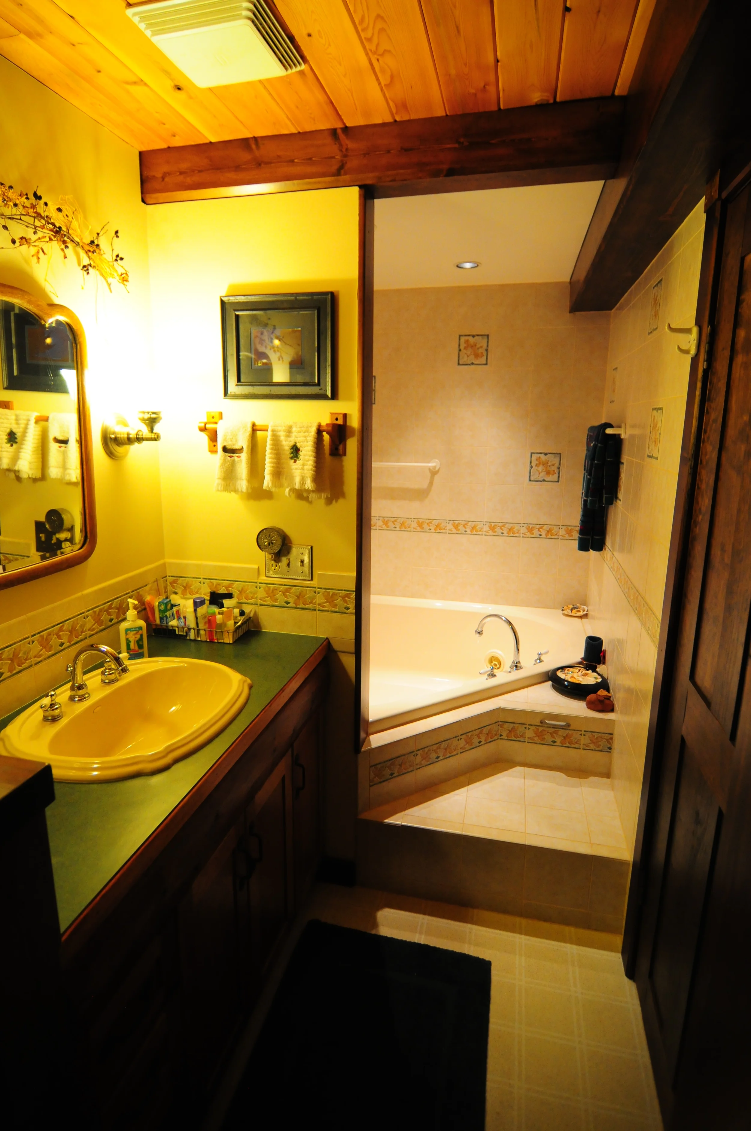 Elegant bath with Jacizzi tub (and shower) for two.