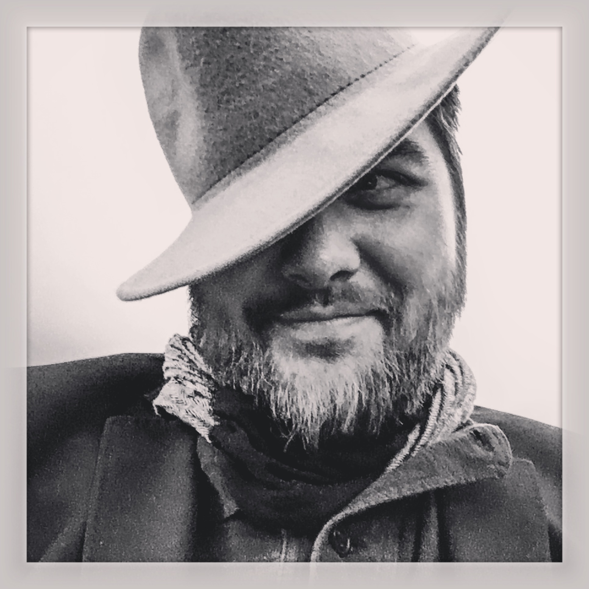 Nate Miller can wear hats and grow beards and rock scarves (He calls them Ascots).
