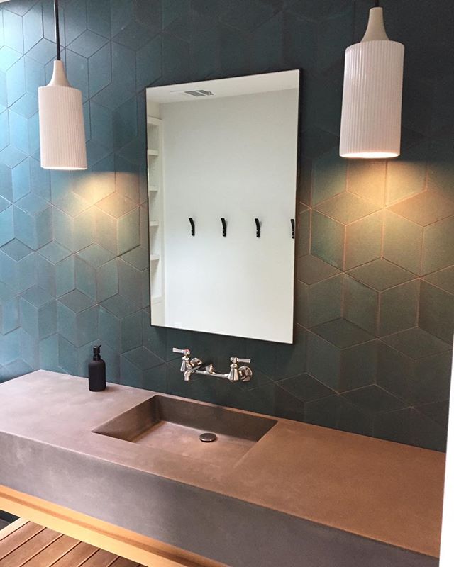 Loving the way the light cast from the @cedarandmoss Tumwater ceramic pendants plays off the texture in the @annsacks geometric wall tile in the pool bath at our #extracthouse Tarrytown remodel project. Architecture by @stuartsampley and built by @wa