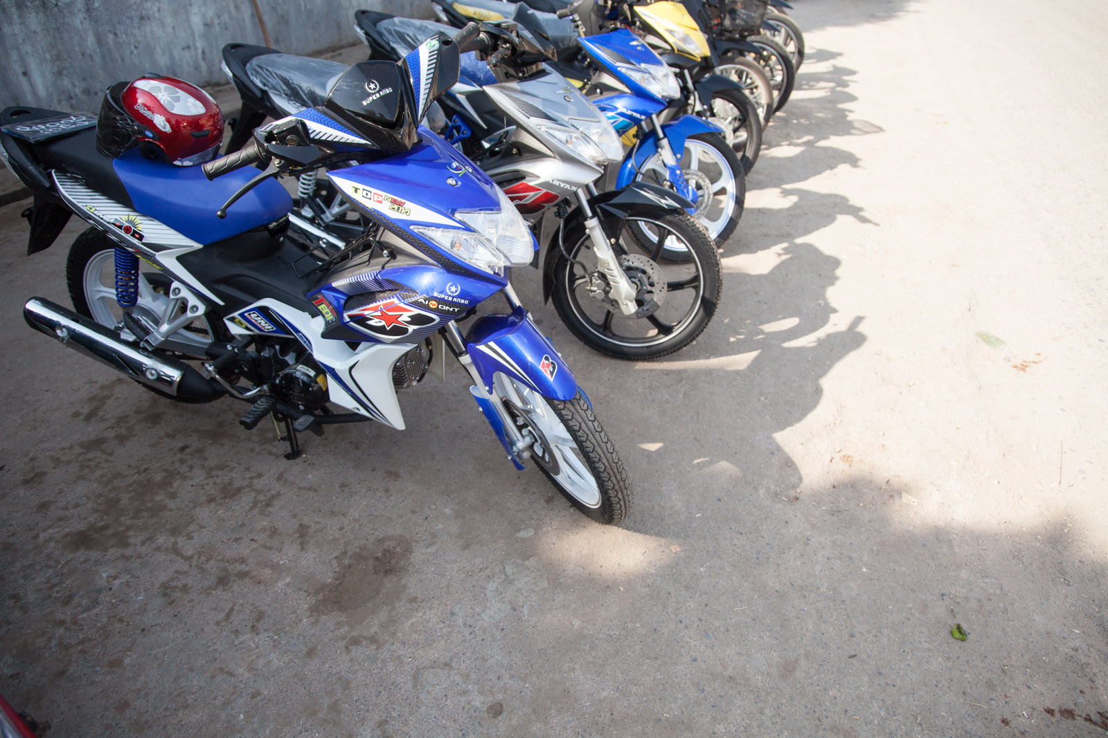 AffordTwo,EatOne-Lashio-015-PurchasingAMotorbike.jpg
