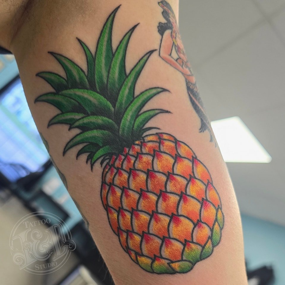 Festive pineapple by @danwatkins.tattoos stop on in where it's always island time here at Ink &amp; Destroy! #pineapple #fruit #tropical #hawaii #islandtime #inkanddestroy #tattoo