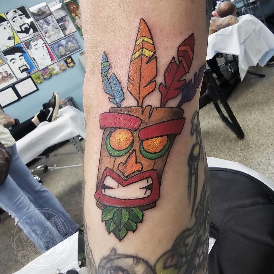 Radical Aku Aku by Andrew Schaub (@fortress.of.dreams ) he's here for all your video game tattoo needs! #sony #crashbandicoot #playstation #akuaku #videogames #gaming #videogametattoo #ps1 #inkanddestroy #tattoo