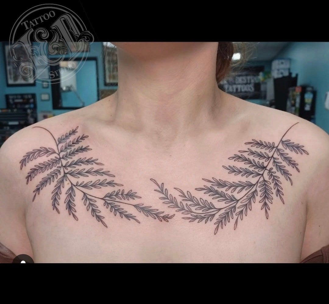 Delicate fern fronds by @stabinks Abi has time today for walk ins, so stop in and see her! #plants #fern #fronds #ferntattoo #chesttattoo #inkanddestroy #tattoo #blackandgray