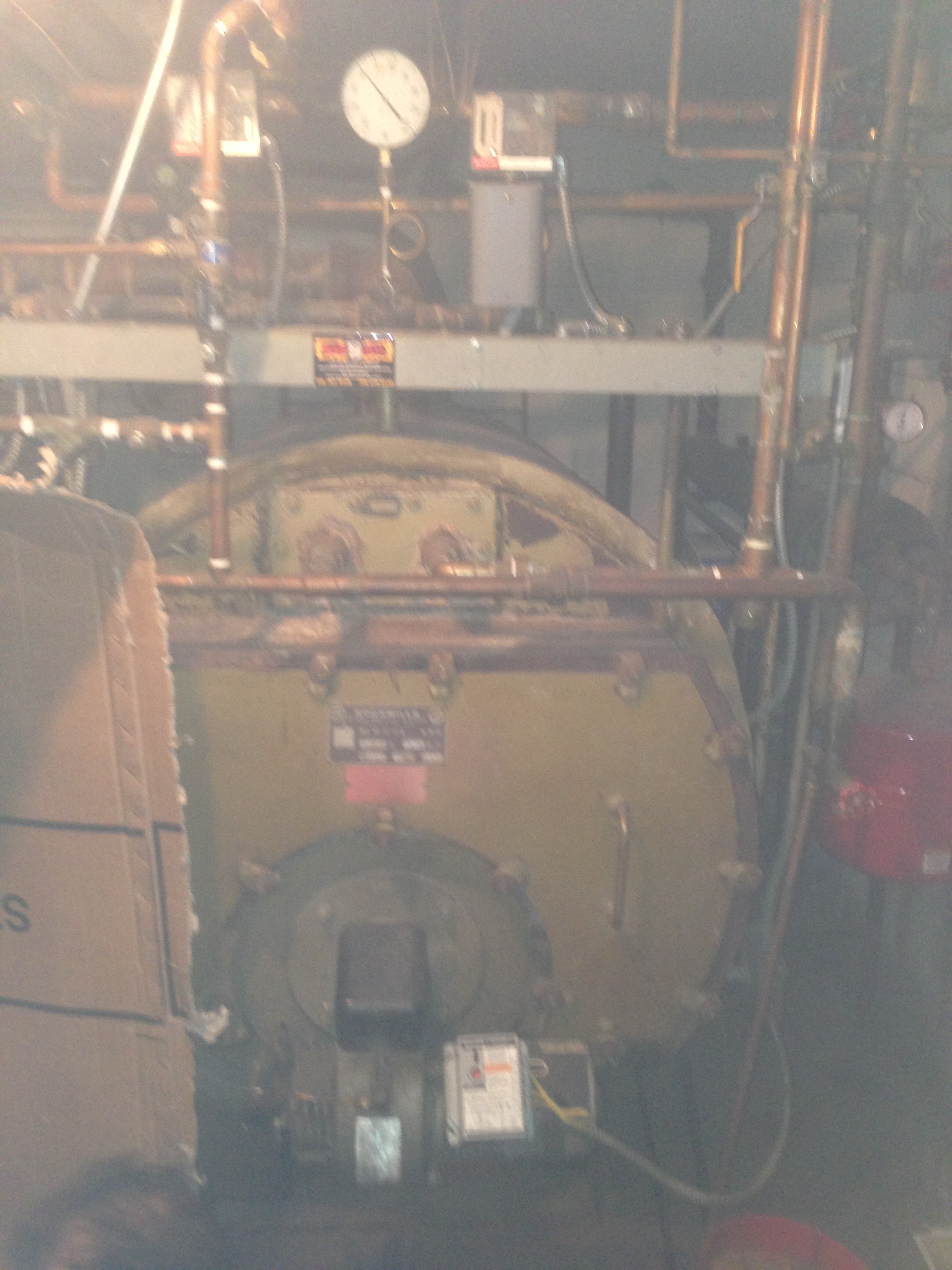 Before: existing steam boiler operating through a heat exchanger