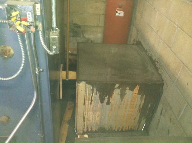 During installation: Working behind the existing boiler