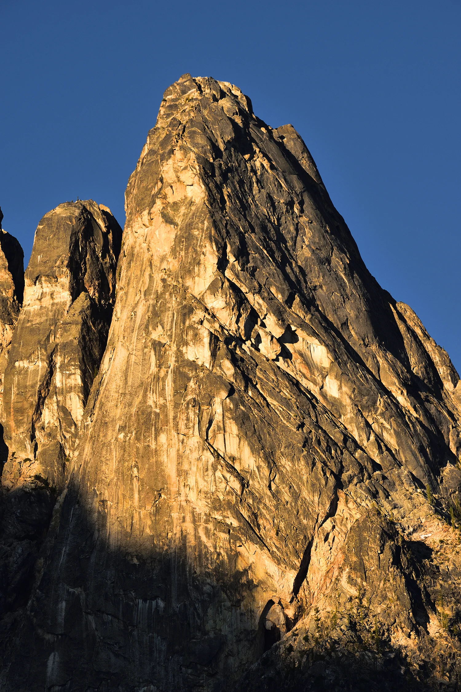 Liberty Bell First Light. Liberty Bell is a spire in the North Cascade Mountains of Washington State. Purchase Options